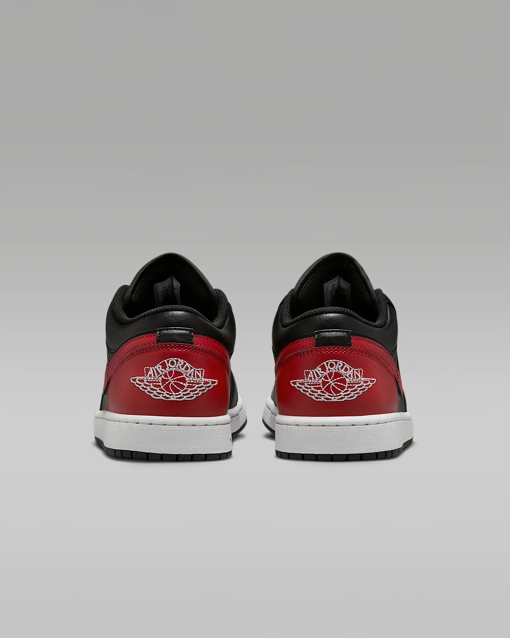 AJ1 Low (Schwarz/Summit White/Varsity Rot)